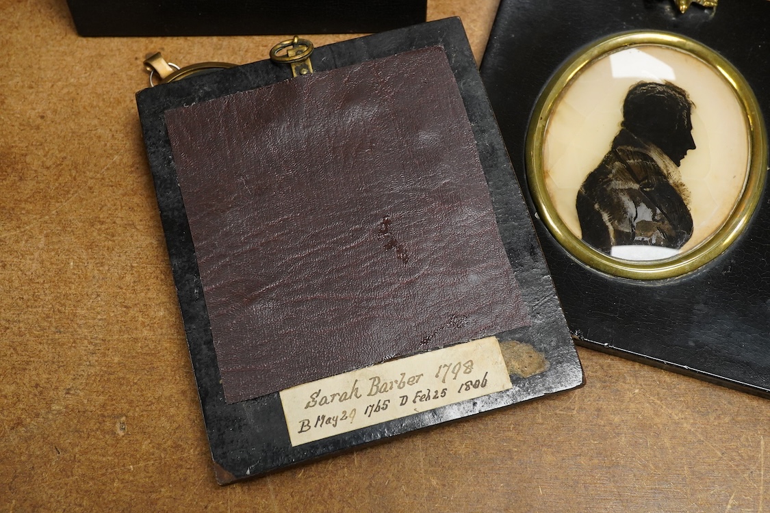 Two 19th century silhouette portraits to include one painted on glass by R. N. Barnes 1836 together with a portrait miniature of a Regency lady and an enamel example, largest 8 x 6.5cm (4)